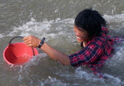 Songkran swimming in clothes